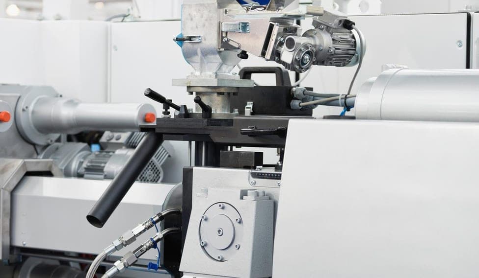A machinery manufacturing site with extrusion moulding equipment