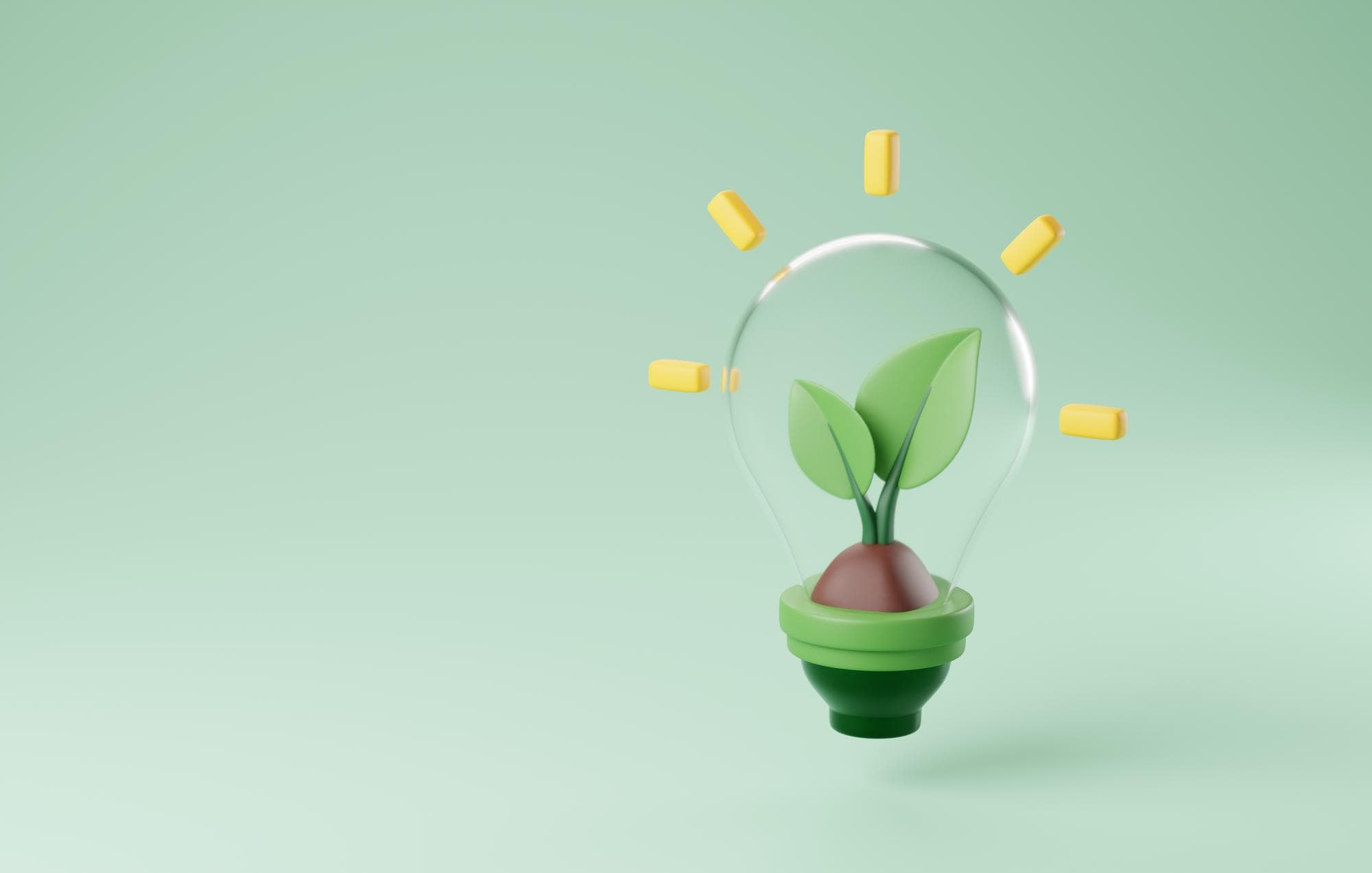 A seedling growing in a pot inside a glass sphere